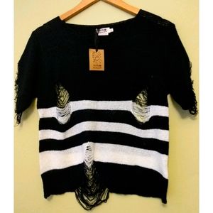 Molly Bracken | NWT black and white distressed top